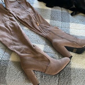 Thigh high heeled boots